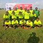 Photo shows players of Benin Warriors FC line up before one of their matches during the Bayern Munich trial program in Benin City.